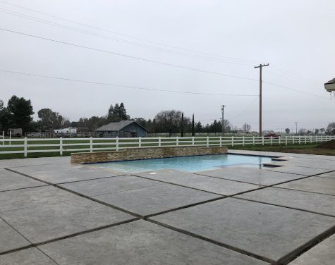 image of a concrete pool deck in Chino, California